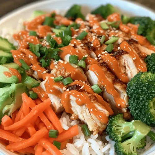 Welcome to the delightful world of the Bang Bang Chicken Bowl, a dish that masterfully combines vibrant flavors, striking visuals, and wholesome ingredients. This irresistible bowl features juicy chicken, colorful vegetables, and aromatic jasmine rice, all brought together by a creamy, spicy sauce that ignites your taste buds. With its perfect balance of protein, vegetables, and carbohydrates, the Bang Bang Chicken Bowl stands out not only for its flavor but also for its health-conscious appeal, making it an excellent choice for anyone looking to enjoy a delicious yet nutritious meal.