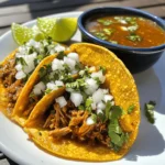 To create a truly unforgettable Birria Bliss Taco, the process begins with the careful sautéing of aromatics. Onions play a crucial role in this step; when you cook them, they undergo a transformation that adds depth and sweetness to the dish. Start by heating a splash of oil in a large pot over medium heat. Add finely chopped onions and cook until they become translucent, about 5-7 minutes. This initial step is not just about softening the onions; it’s about building a foundation of flavor that will enhance the entire dish.