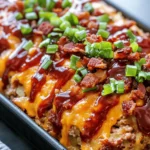 Meatloaf has long been cherished as one of America’s favorite comfort foods. This classic dish combines ground meat with a medley of seasonings, often forming a hearty loaf that’s baked to perfection. While traditional meatloaf recipes usually feature basic ingredients, we’re taking this beloved dish to the next level with our Ultimate Loaded Potato Meatloaf Recipe.