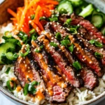 Korean cuisine has captivated taste buds around the globe, and among its myriad of delicious offerings, the Korean BBQ Steak Rice Bowl stands out as a favorite. This dynamic dish seamlessly blends flavors and textures, creating a culinary experience that is as vibrant as it is satisfying. At the heart of this bowl is marinated flank steak, which is grilled to perfection and served atop a fragrant bed of jasmine rice. The addition of fresh vegetables brings a burst of color and nutrition, while a spicy cream sauce elevates the entire dish with its unique kick.