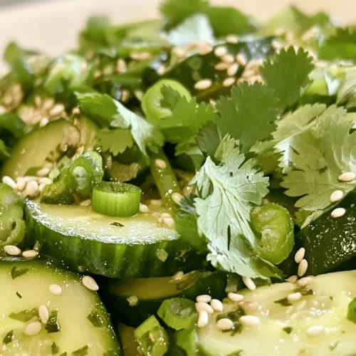 Cucumber salads are a beloved staple in various Asian cuisines, celebrated for their refreshing qualities and vibrant flavors. Whether enjoyed as a side dish at a summer barbecue, a light appetizer to kick off a multi-course meal, or even as a main course for a light lunch, cucumber salads have found a way to steal the spotlight on dining tables across the globe. The Crisp & Zesty Asian Cucumber Salad takes this tradition and elevates it with a harmonious blend of fresh ingredients, zesty flavors, and a delightful crunch.